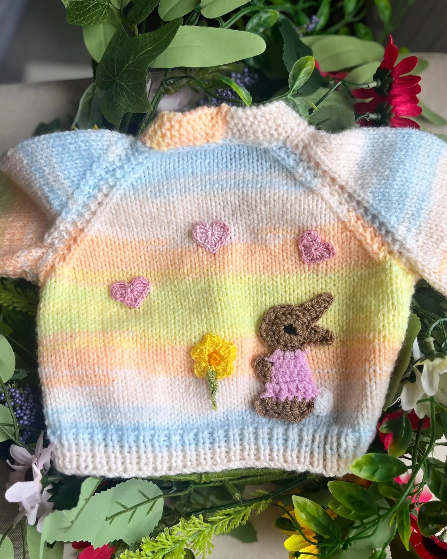 Little Flower Knits eco-friendly baby girl cardigan gift with knitted bunny and hearts design