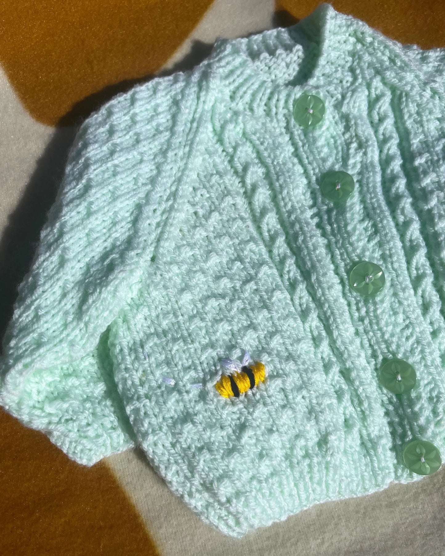 Lemon embroidery cardigan for babies with green buttons and detailed knit pattern from Little Flower Knits