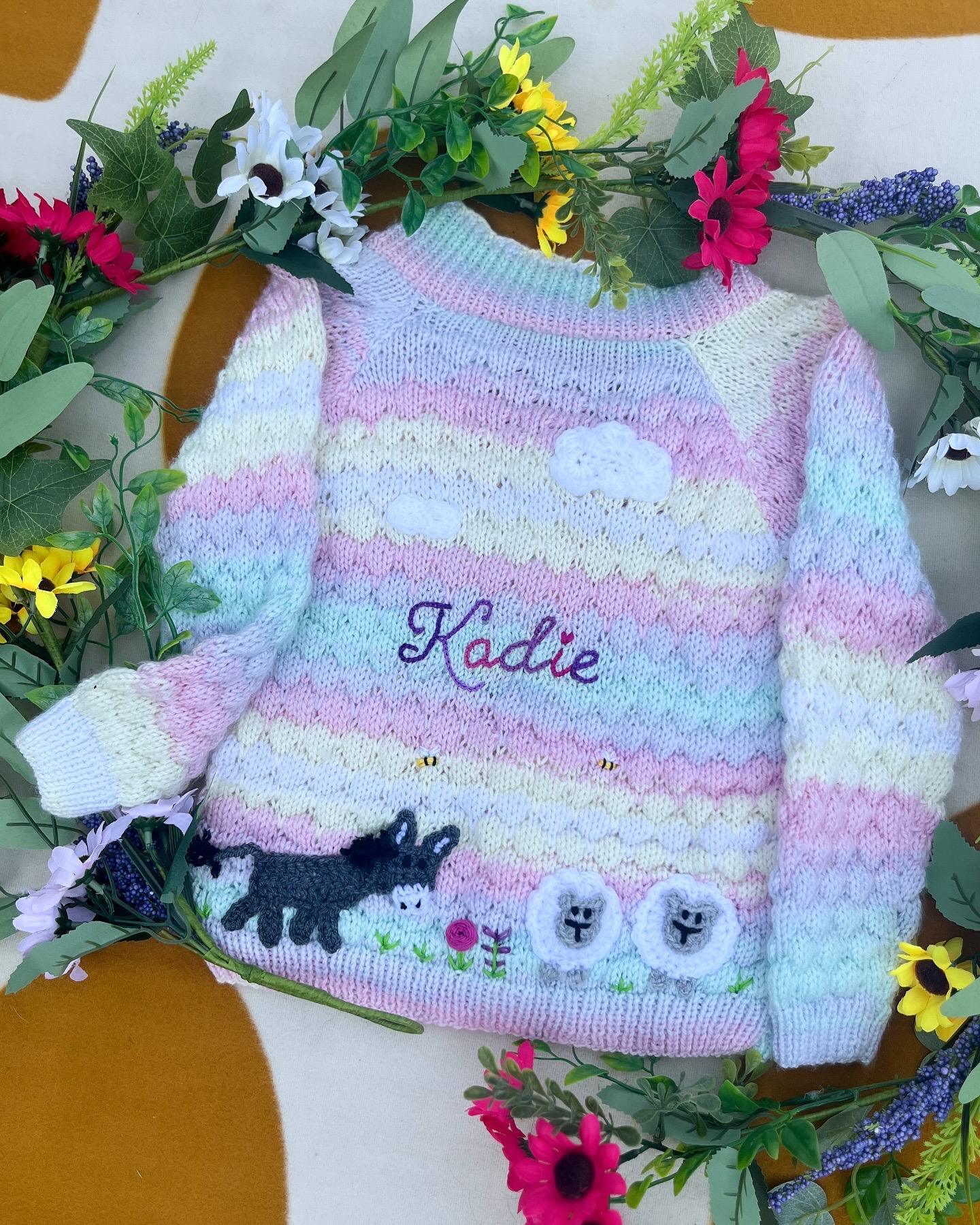 Personalised farm cardigan for toddlers knitted in pastel stripes with animal buttons and name Kadie