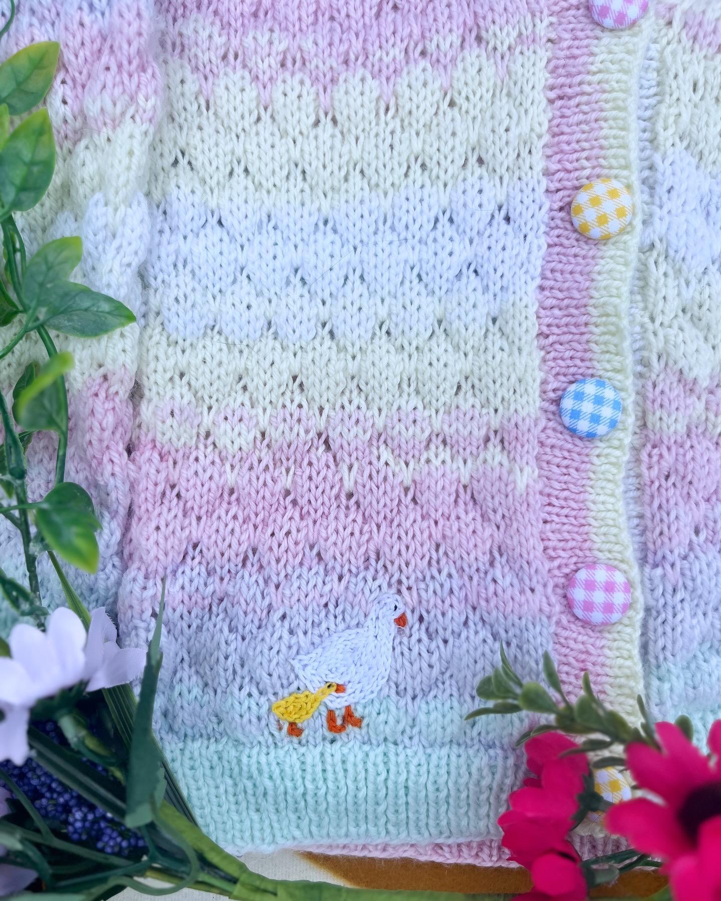 Little Flower Knits personalised farm cardigan for toddlers in pastel colours with patterned buttons and duck embroidery