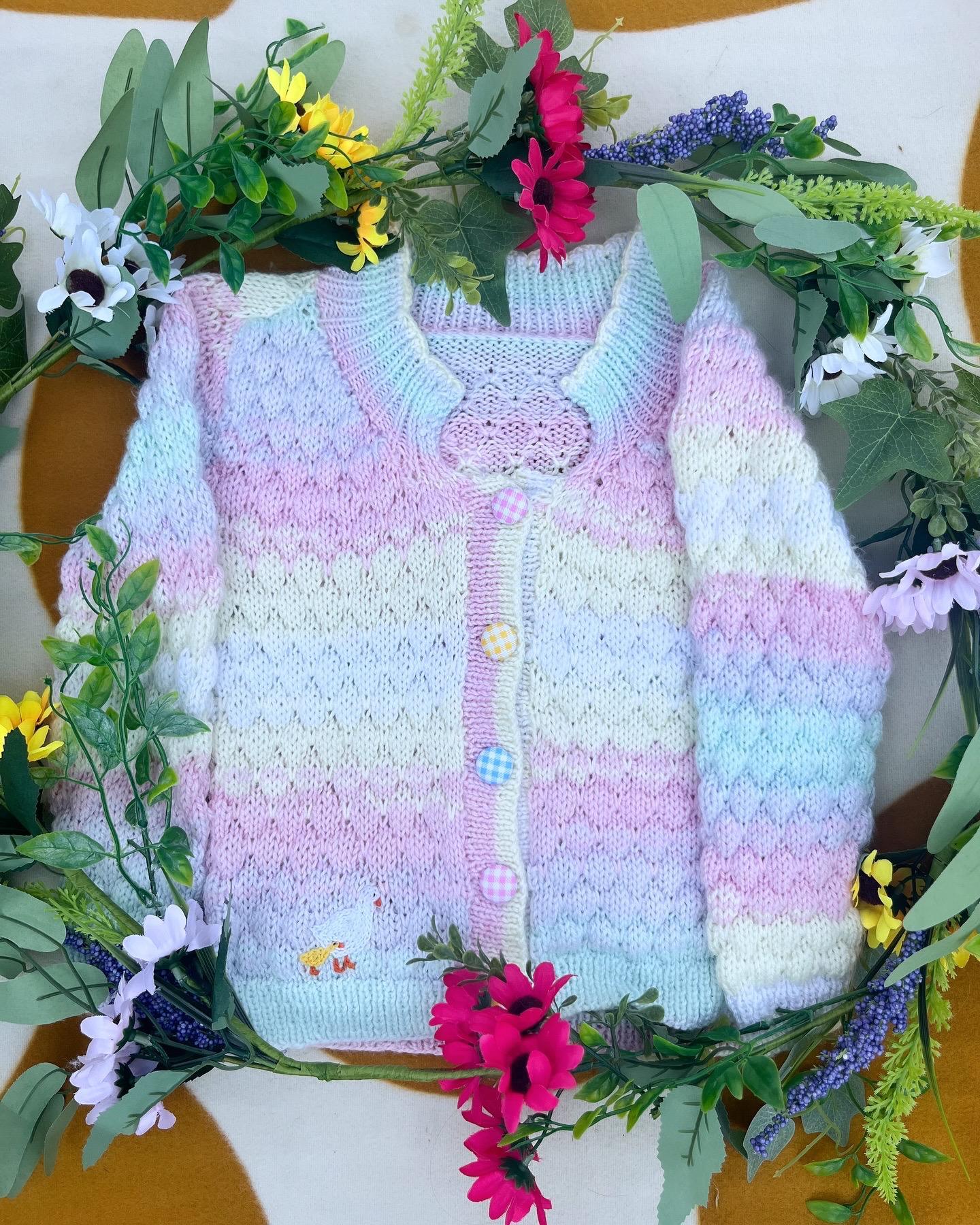 Little Flower Knits personalised farm cardigan for toddlers in pastel colours with patterned buttons