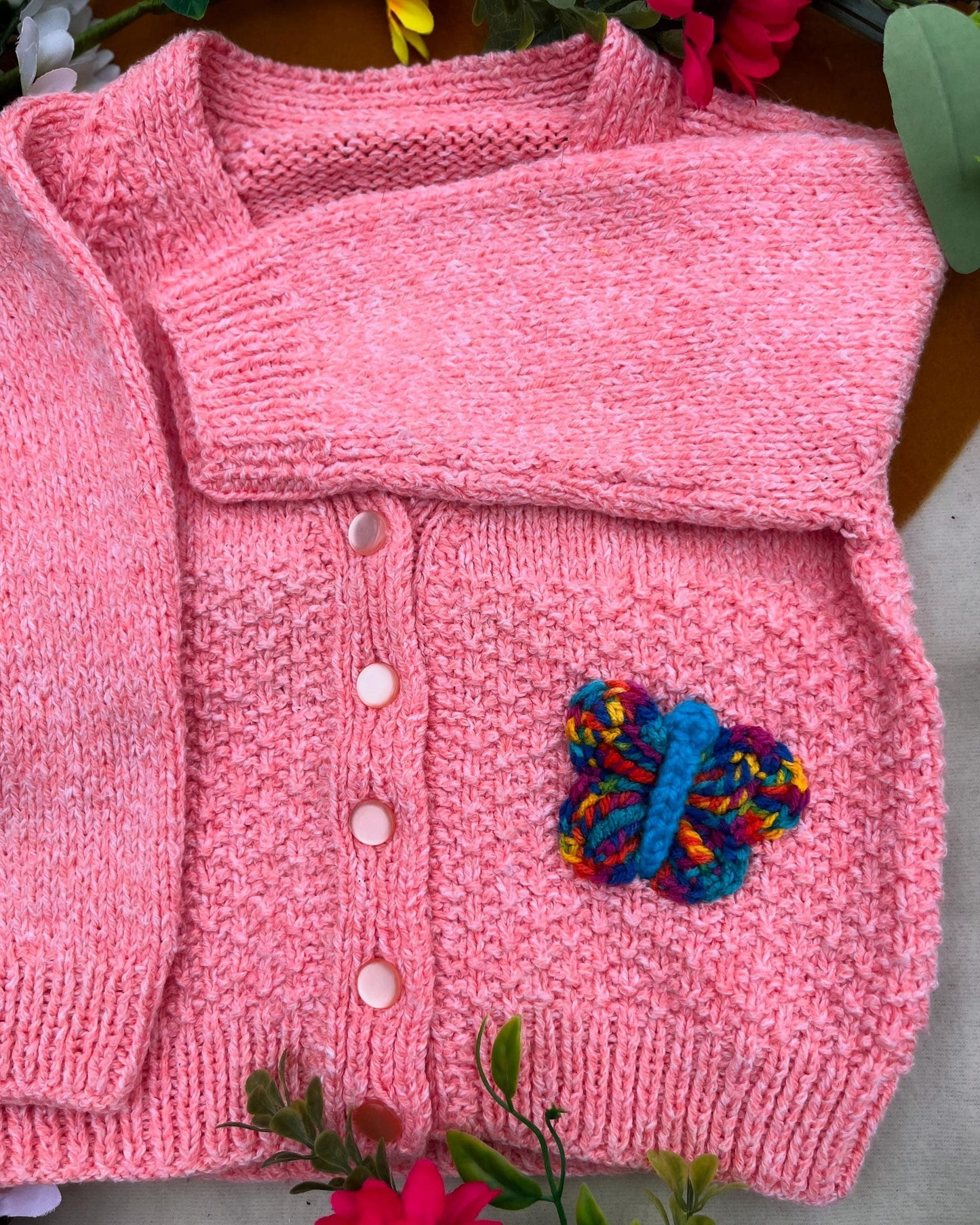 Pink toddler cardigan with unique animal design butterfly knitted button by Little Flower Knits