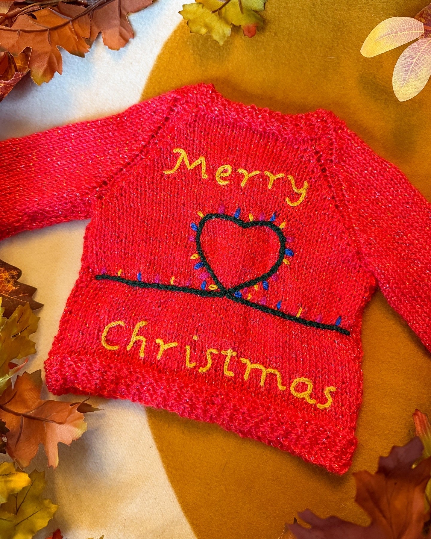 Bright red Christmas baby cardigan 3-6 months with festive 'Merry Christmas' and heart design