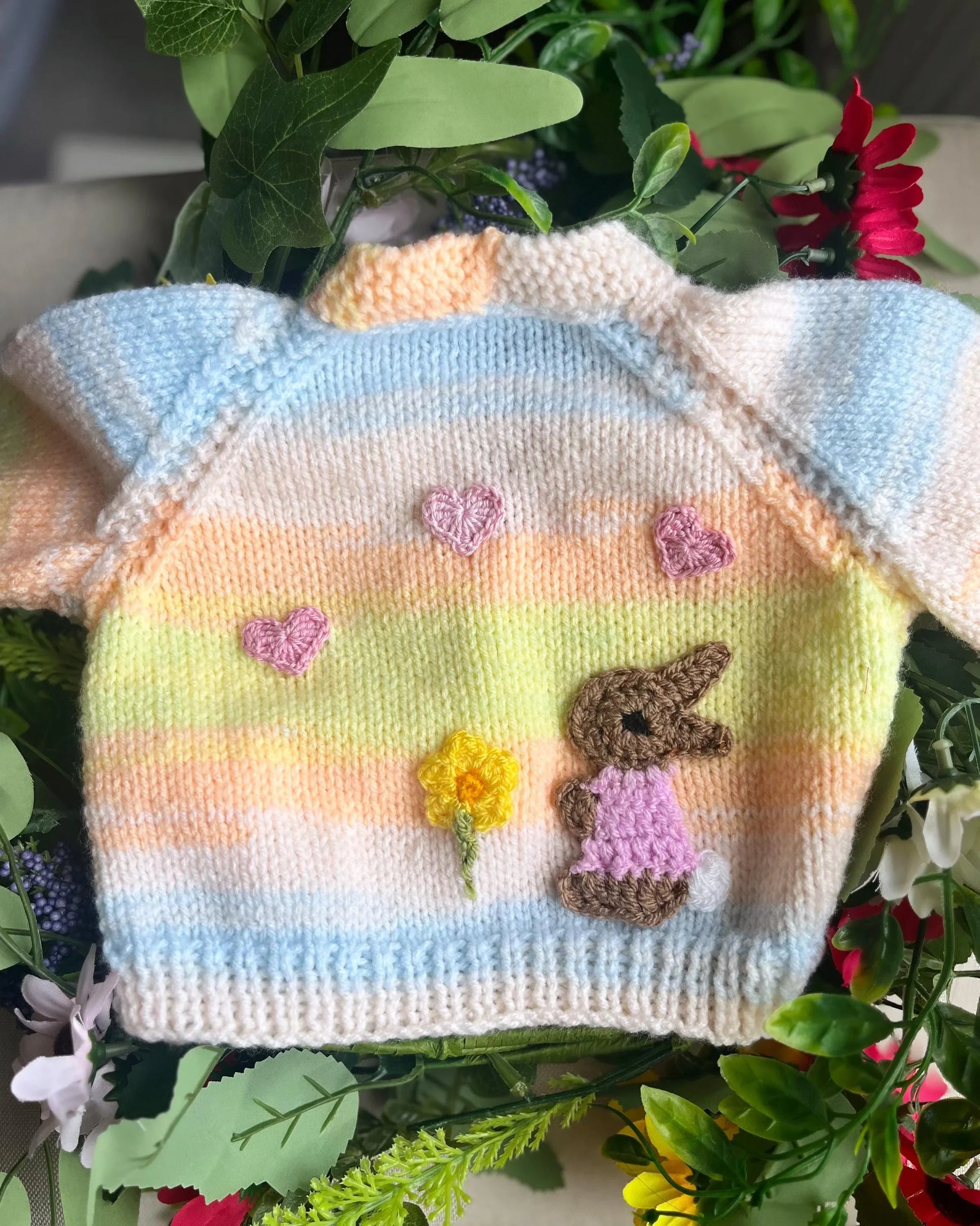 Little Flower Knits eco-friendly baby girl cardigan gift with knitted bunny and hearts design