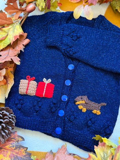 Navy blue Grinchmas cardigan for toddlers with colourful gift and dachshund designs