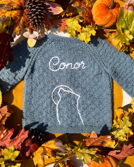 Little Flower Knits personalised blue knitted jumper with Conor name and wolf outline unique boy wolf gift ideas