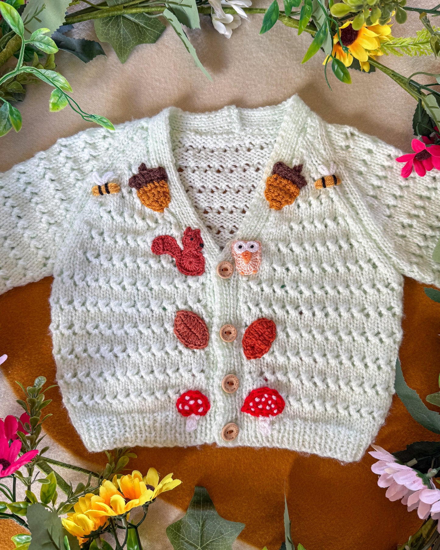 Handmade baby cardigan 9-12 months with colourful woodland embellishments and wooden buttons