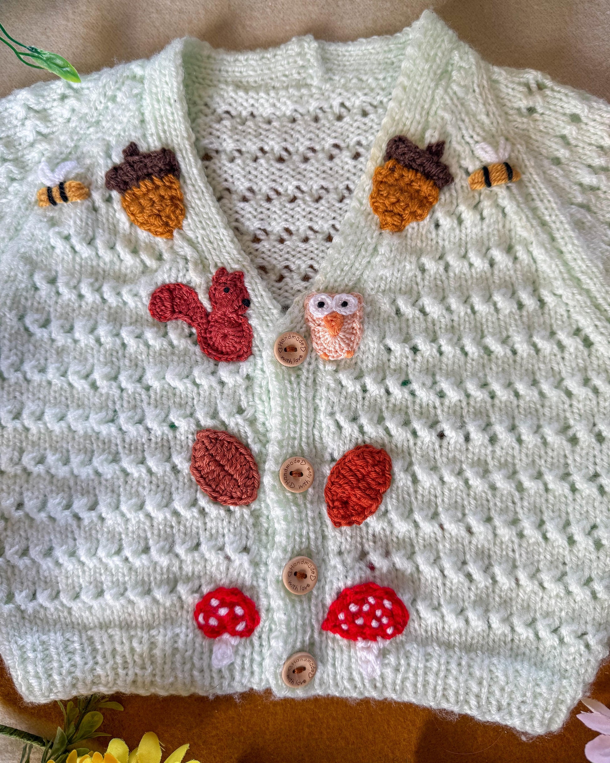 Handcrafted Little Flower Knits Knitted Cardigan with Nature-Inspired Embroidery and Wooden Buttons