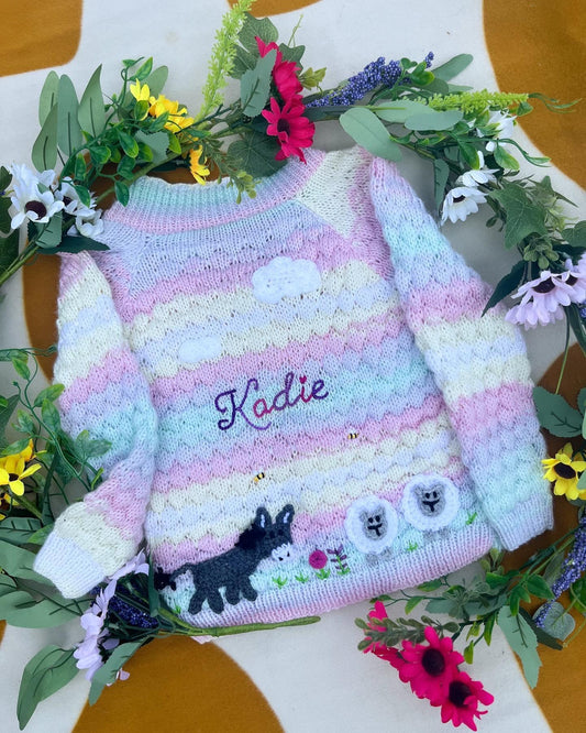 Personalised farm cardigan for toddlers in pastel colours with knitted donkey sheep and name Kodie