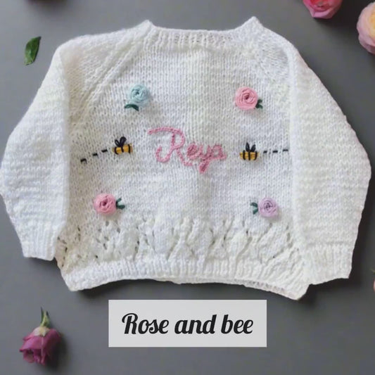 Personalisable rose design | 0-5 | Hand-knitted
