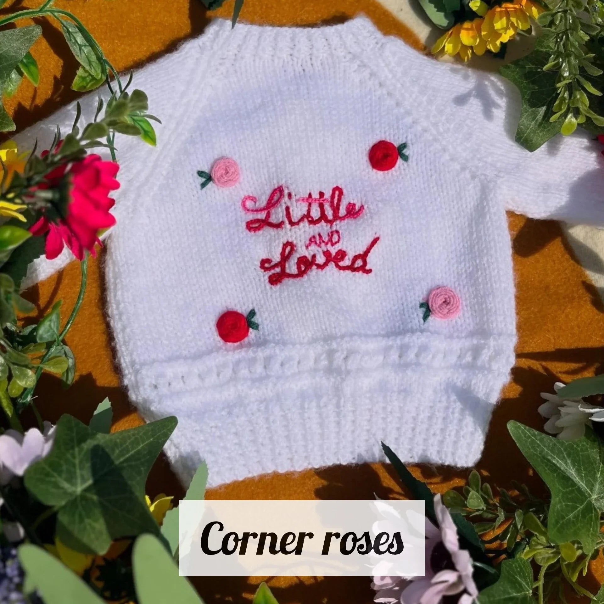 White sustainable kids knitwear with flowers knitted jumper by Little Flower Knits with Little and Loved design