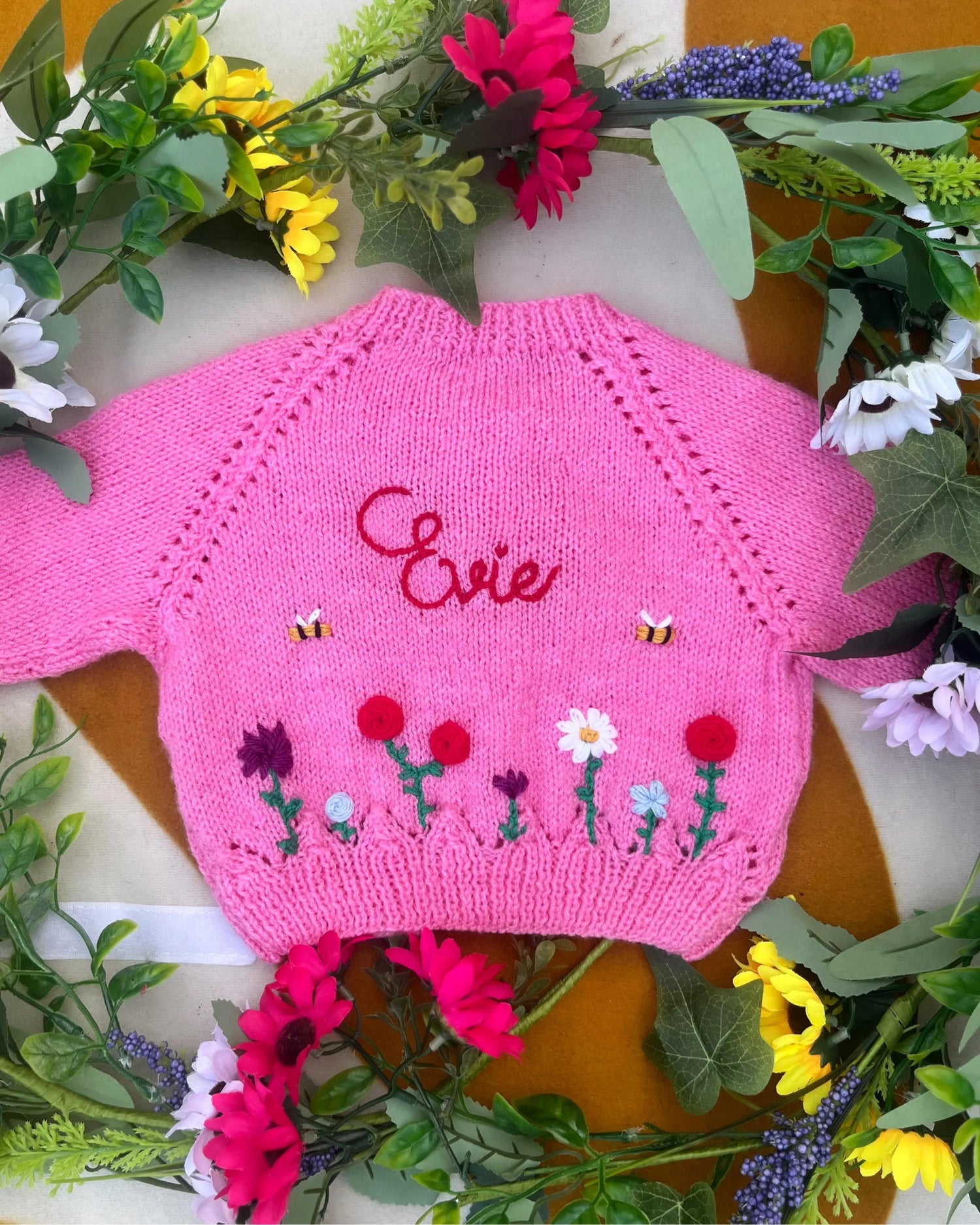Pink unique floral cardigan for girls with embroidered flowers and bees by Little Flower Knits