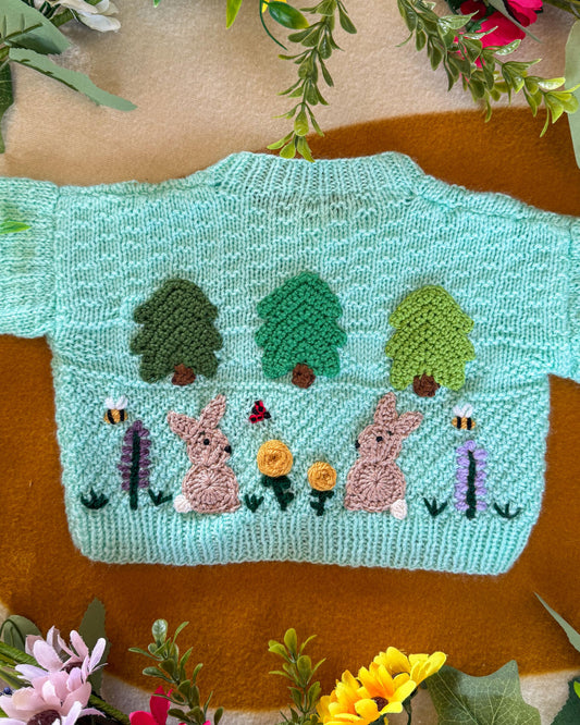 Wildflower meadow baby cardigan in soft mint with embroidered bunnies and flowers