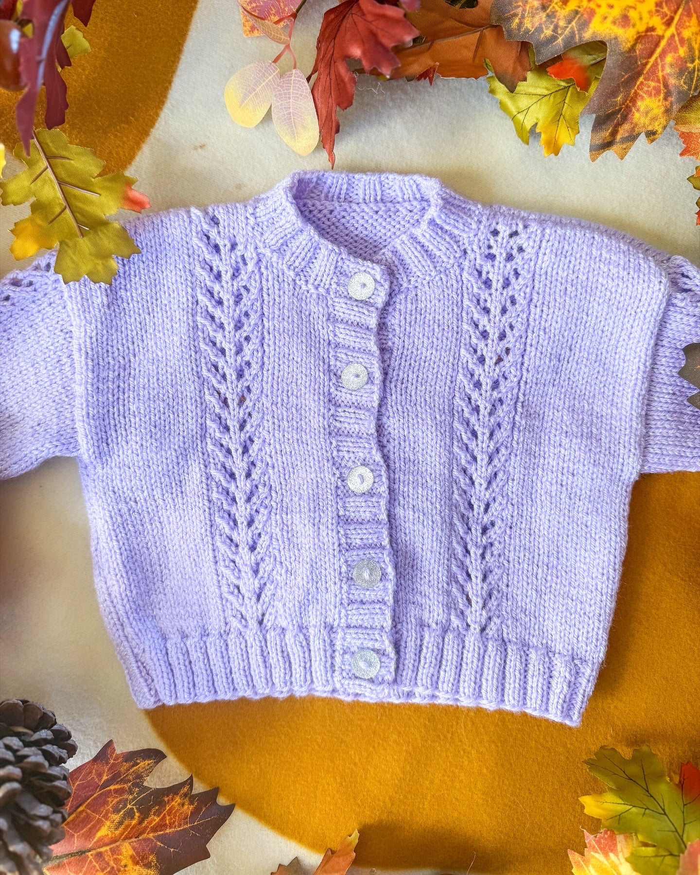 Light purple wish upon a star baby cardigan with delicate lace detailing and button closure